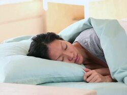 MS Sick woman sleeping at bed / Richmond, Virginia, United States Stock Footage