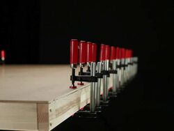 CU, Lockdown, man putting clamps on a construction frame, focus on hands Stock Footage