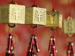 CU R/F Hanging Yen and Dollar signs decorations depicting / Singapore, Singapore, Singapore  Stock Footage