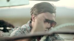 Cadillac driver drums on the steering wheel Stock Footage