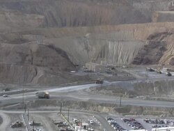 Dump truck truning down road Stock Footage