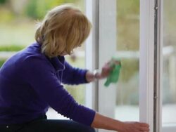 Washing a window Stock Footage
