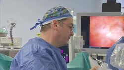 Robot Revolution: DaVinci Surgical Robot News Clip