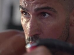 Man doing standing alternating cable chest press and  CrossFit workout at the gym.  - Slow Motion - 1920x1080 - filmed at 200 fps Stock Footage