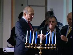 Israeli PM Olmert lighting Hanukkah candles News Clip