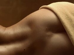 HD Super Slow-Mo: Sensual Woman Lying In Sauna Stock Footage