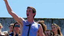 MS Male football fan with a number one painted on chest standing cheering in crowd in stadium Stock Footage