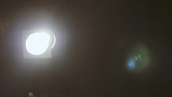 Bright flashlight in dark at music concert Stock Footage