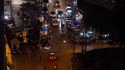Traffic on junction at night Stock Footage
