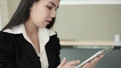 Portrait of young businesswoman in the office Stock Footage