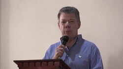 VOICED : Colombia: Santos despide muertos por alud alista reconstruccion News Clip