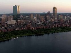 AERIAL, Boston downtown buildings at sunset, Massachusetts, USA Stock Footage