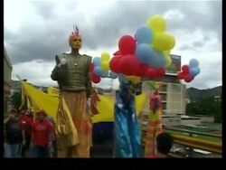 Pro and anti Chavez marches on May Day News Clip