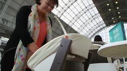 Designer high chairs on trend at London baby show News Clip