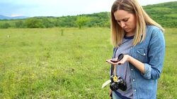 Female hiker taking a rest from walking Stock Footage