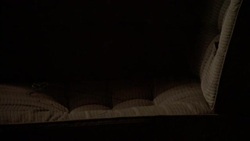 Soaked bedding is crumpled against a wall in a flood-damaged room. Stock Footage