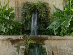 TD fountain and water channel in the gardens of the Alcazar Palace Stock Footage