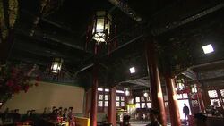 Taoists kneel in the Baiyun Guan as they chant. Stock Footage