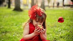 Girl eating apple Stock Footage