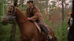 Men racing horses in the forest, 1908 - reenactment. Clip 1 Stock Footage
