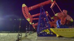 aerial view of oil field with pump units 4k Stock Footage