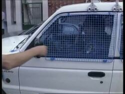 More pictures, Milosevic handed over to war crimes tribunal News Clip