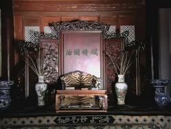 MS ZI Shot of seat and settings next to it in hall of Mufu Palace / Lijiang, Yunnan Province, China Stock Footage