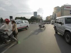 REAR POV WS Traffic Along Busy Street / Vietnam Stock Footage