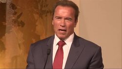 Former Gov. Arnold Schwarzenegger lifted the curtain on his official portrait on Monday, revealing a photograph-like giant image of the onetime bodybuilder standing in front of the official California seal. (Sept. 8) News Clip