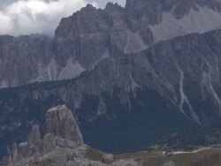 Clouds Cver Dolomites Mountains TILT UP Stock Footage