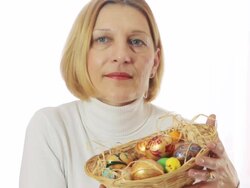 Mature woman with Easter eggs Stock Footage