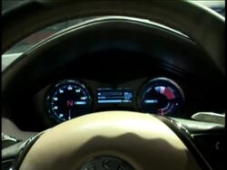 A new American car company will soon have its first offering hit the streets. The Fisker Karma is a 4-door plug-in hybrid targeting the luxury market, with a sticker price of $87,900. But the AP's Lee Powell found it can be had for less. News Clip