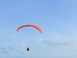 Silhouette Of A Paraglider Stock Footage