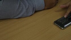 Businessman analyzing data on mobile Stock Footage