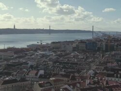  WS Bridge of 25 April with sity  / Lisbon, Lisbon, Portugal Stock Footage