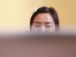 Woman using computer Stock Footage