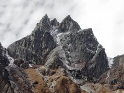 Time-lapse of clouds passing over rocky Himalayan peaks. Cropped. Stock Footage
