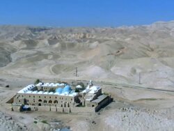 Aerial Nebi Musain in the Judea desert near the Dead sea, Israel Stock Footage