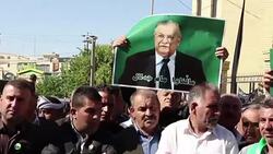 CLEAN : Tens of thousands in Kurd city for Iraq ex president's funeral News Clip