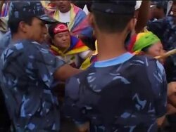 Pro-Tibet protesters scuffle with police near China border News Clip