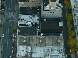 Aerial flying over Harlem looking directly down on streets in NYC Stock Footage