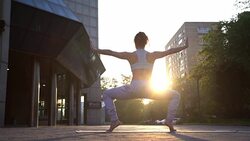 Young Woman Doing Yoga Meditation Exercises at Sunset Stock Footage
