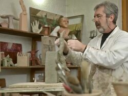 HD DOLLY: Sculptor Artist Modeling Clay Stock Footage