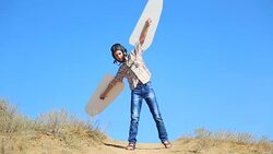 boy with wings playing pilot Stock Footage