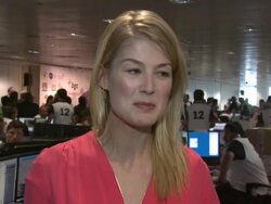 INTERVIEW: Rosamund Pike on trading, Barnardo's charity and Usain Bolt at BGC Annual Global Charity Day at BGC Partners on September 11, 2012 in London, England (Footage by WireImage Video/Getty Images) Stock Footage