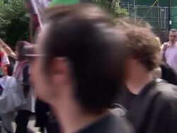 Protesters March Against Missiles for Olympics News Clip