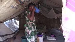 CLEAN : Dispaced people return to scene of massacre in Central Africa News Clip