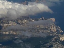 AERIAL Les Calanques and clouds/ ZO city at foot of mountains/ Marseilles, France Stock Footage