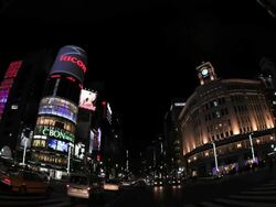 MS View of illumination city at night and moving traffic on road / Ginza, Tokyo, Japan Stock Footage