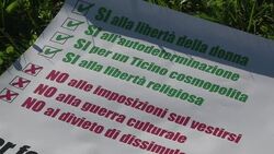 CLEAN : Swiss region bans full face Muslim veil News Clip